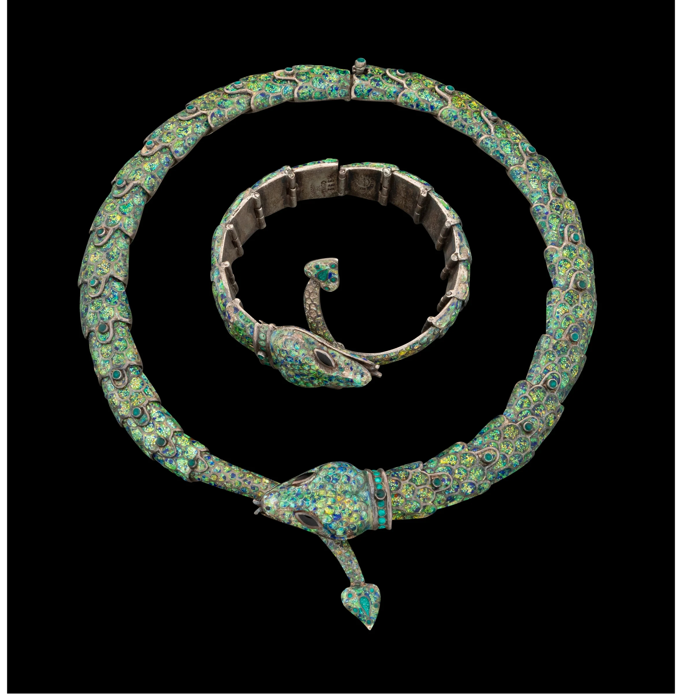 Margot de Taxco champlevé serpent necklace with the matching bracelet coiled inside the chain. Both are stamped 5554.
