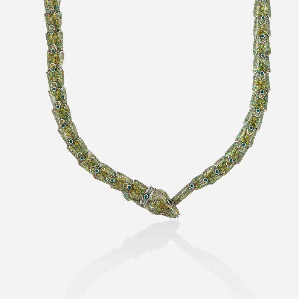 Articulated snake necklace, each scale enameled in green and yellow over silver with a green enamel eye, by Margot de Taxco