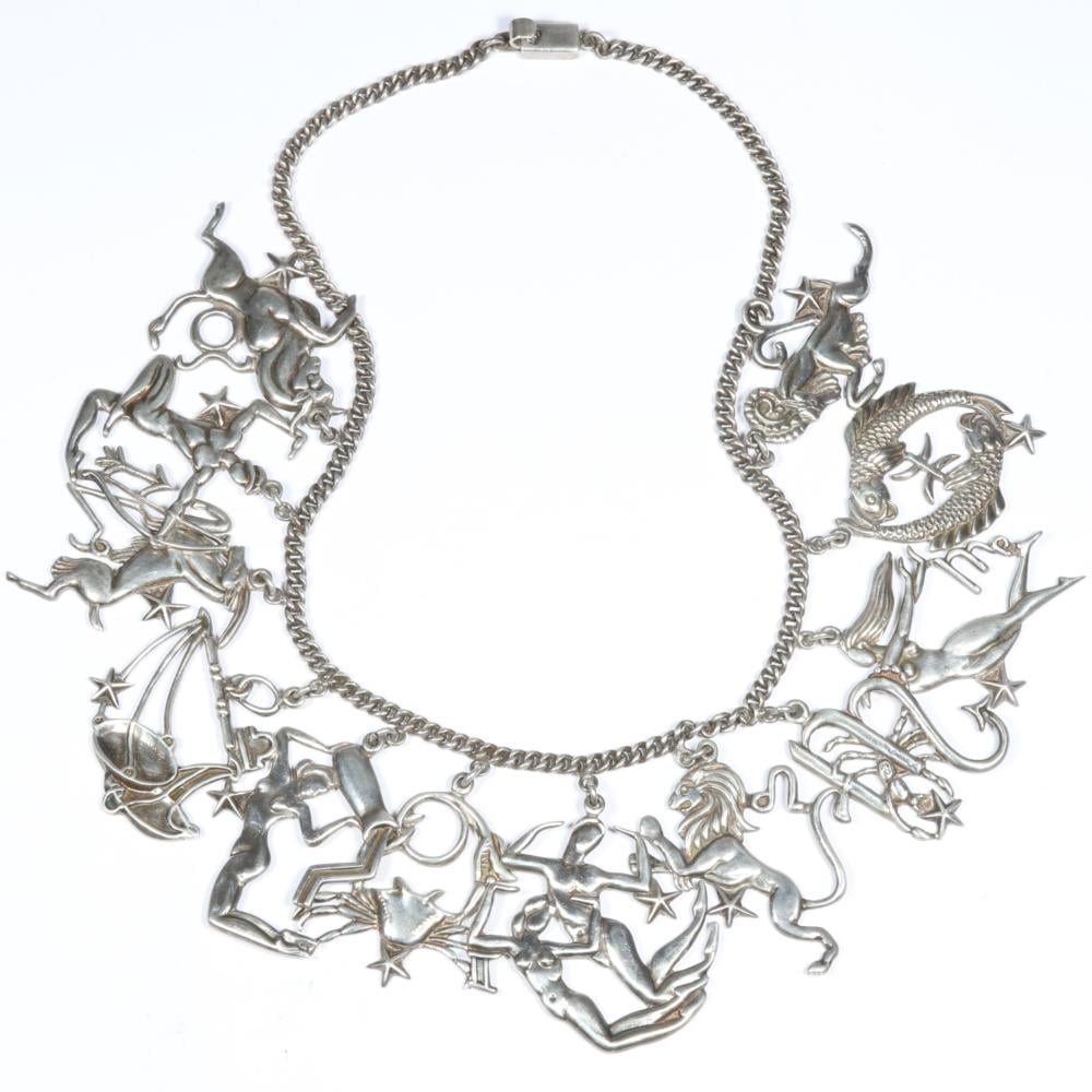 Silver piece from the Zodiac design family