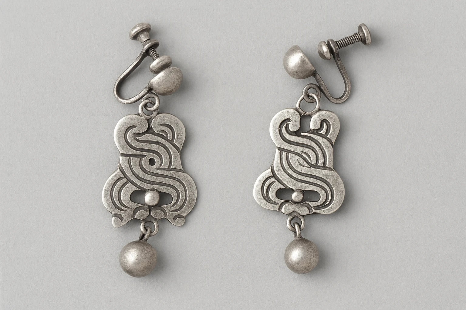 William Spratling Earrings of Scrolled Bands with Incised Lines