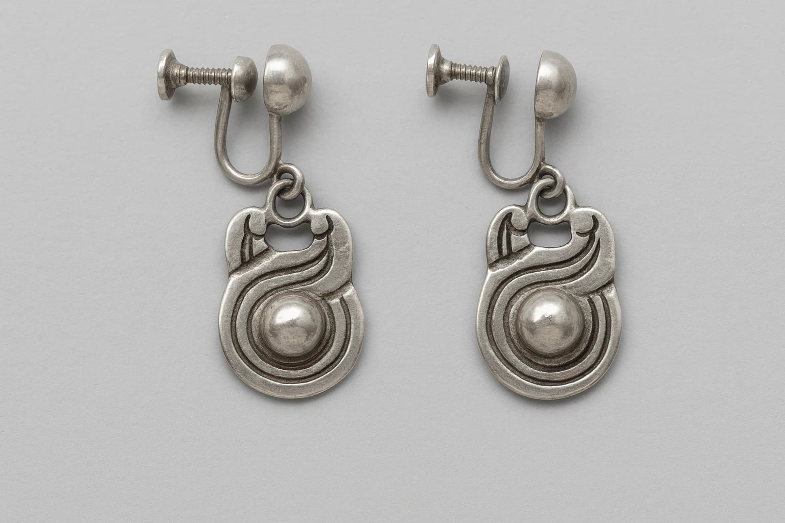 William Spratling Earrings of a Scrolled Band with Incised Lines