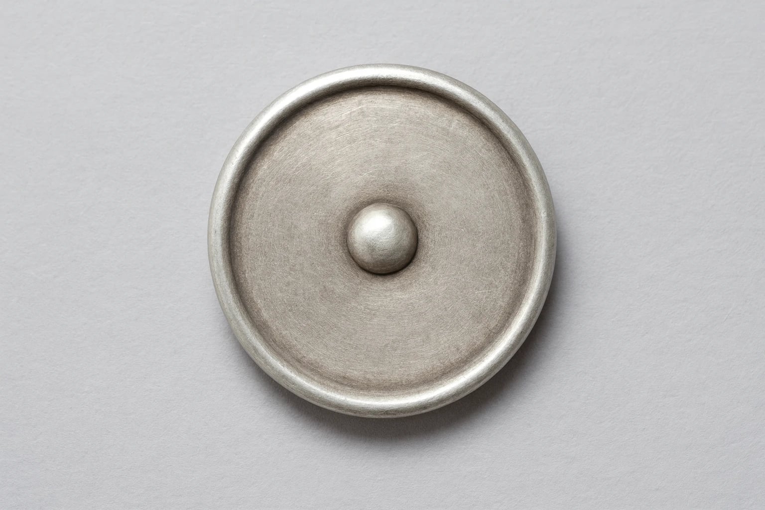 William Spratling Rimmed Button with Ball in Center