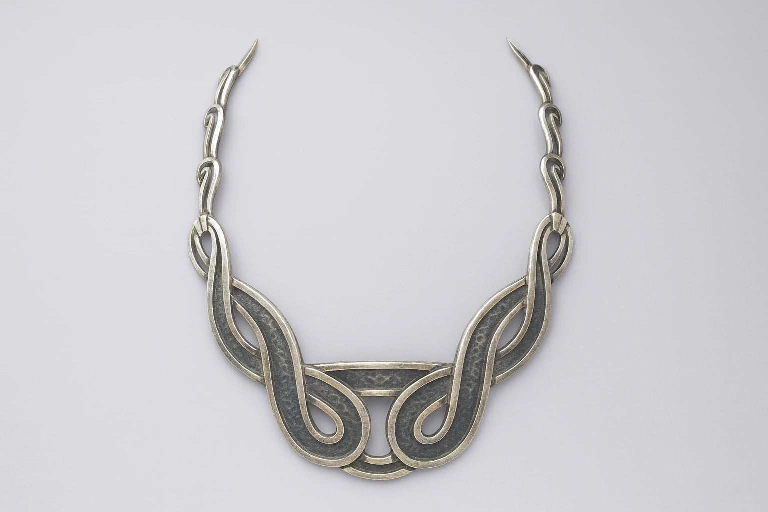 Silver piece from the Figure-Eight, Design No. 5100 design family