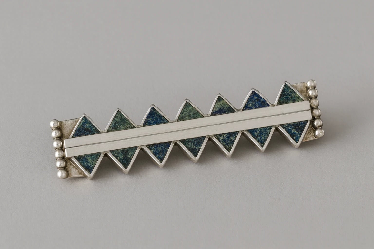 William Spratling Bar Brooch of Azur-Malachite Triangles