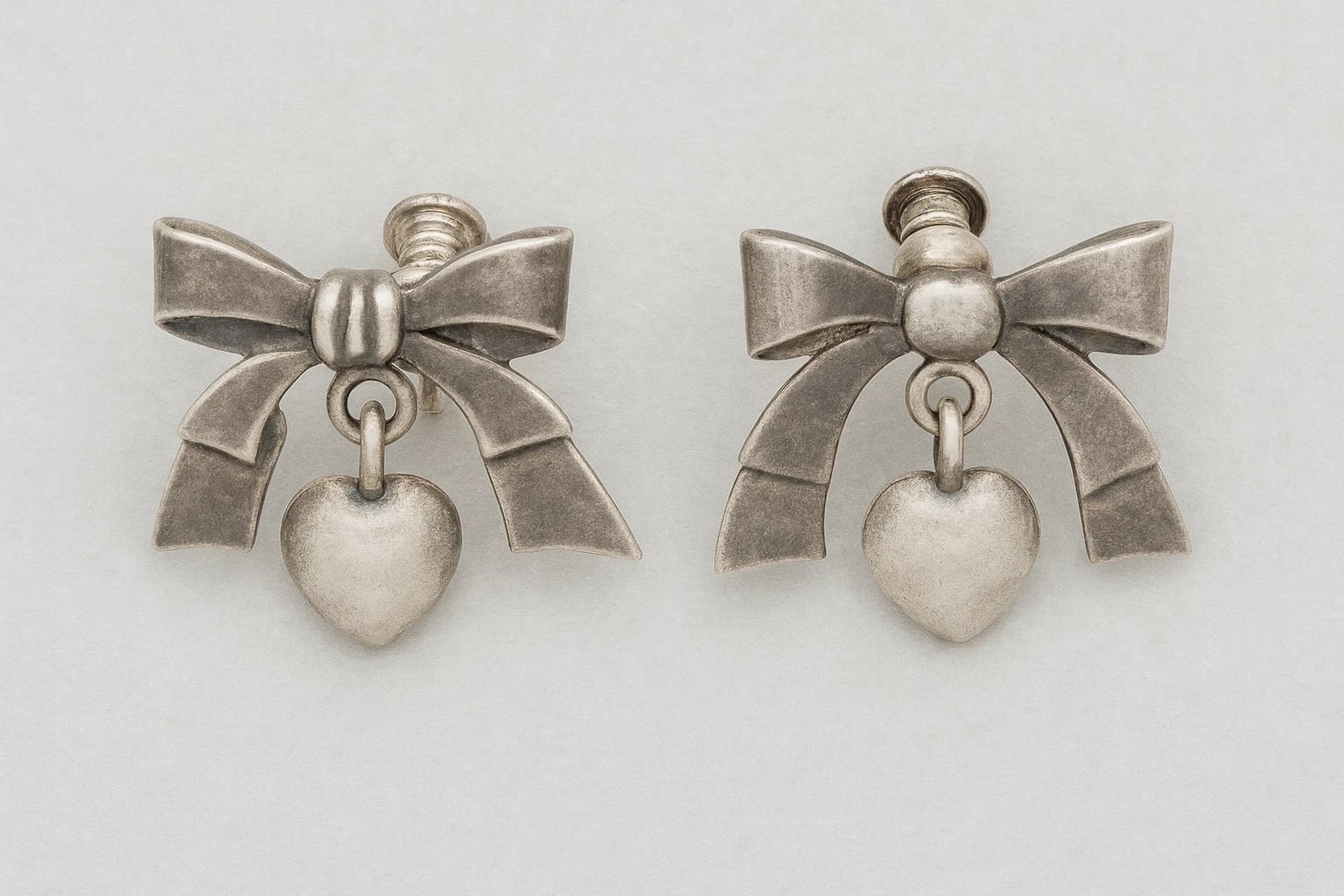 William Spratling Bow and Heart Earrings