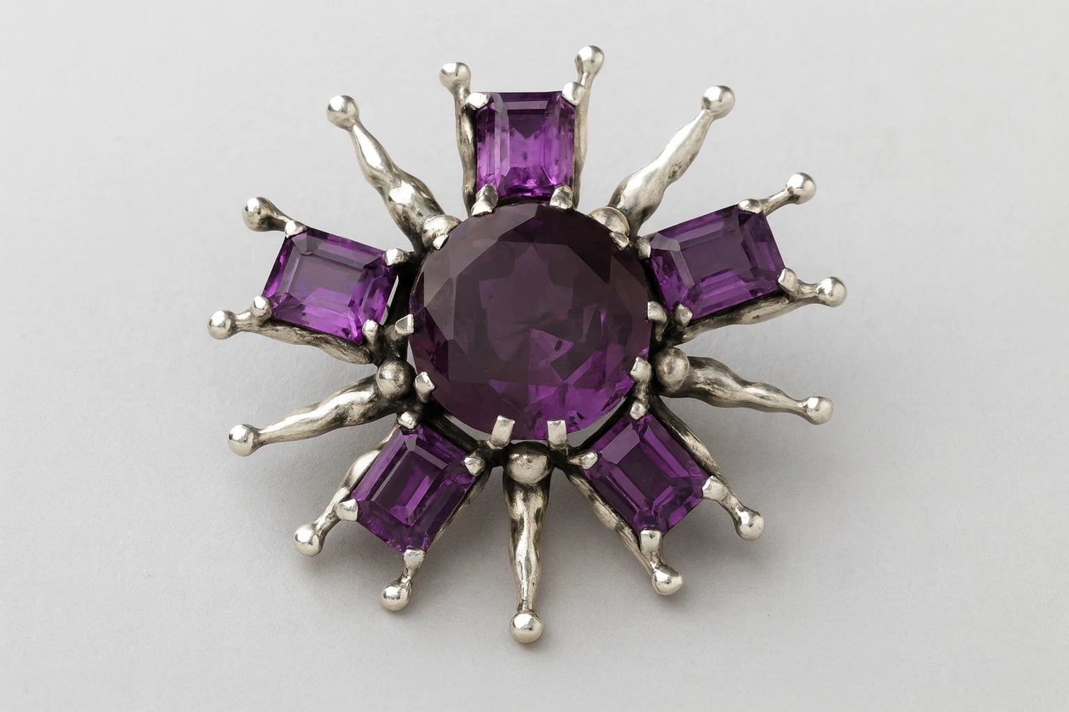 William Spratling Amethyst Sunburst Brooch