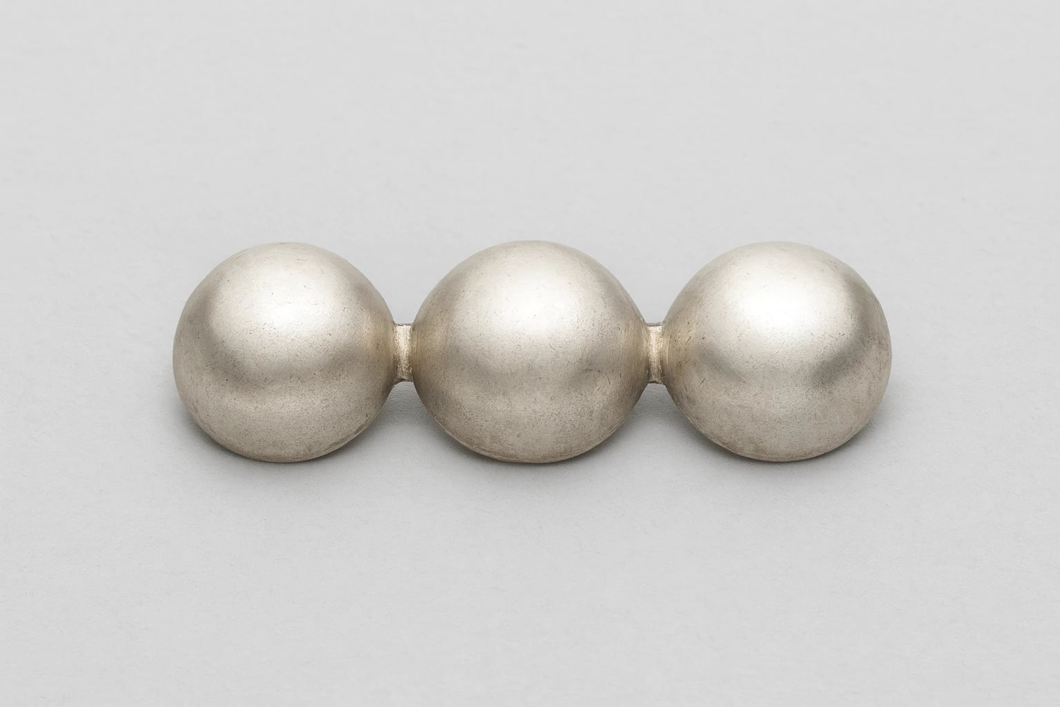William Spratling Bar Brooch of Three Half Balls