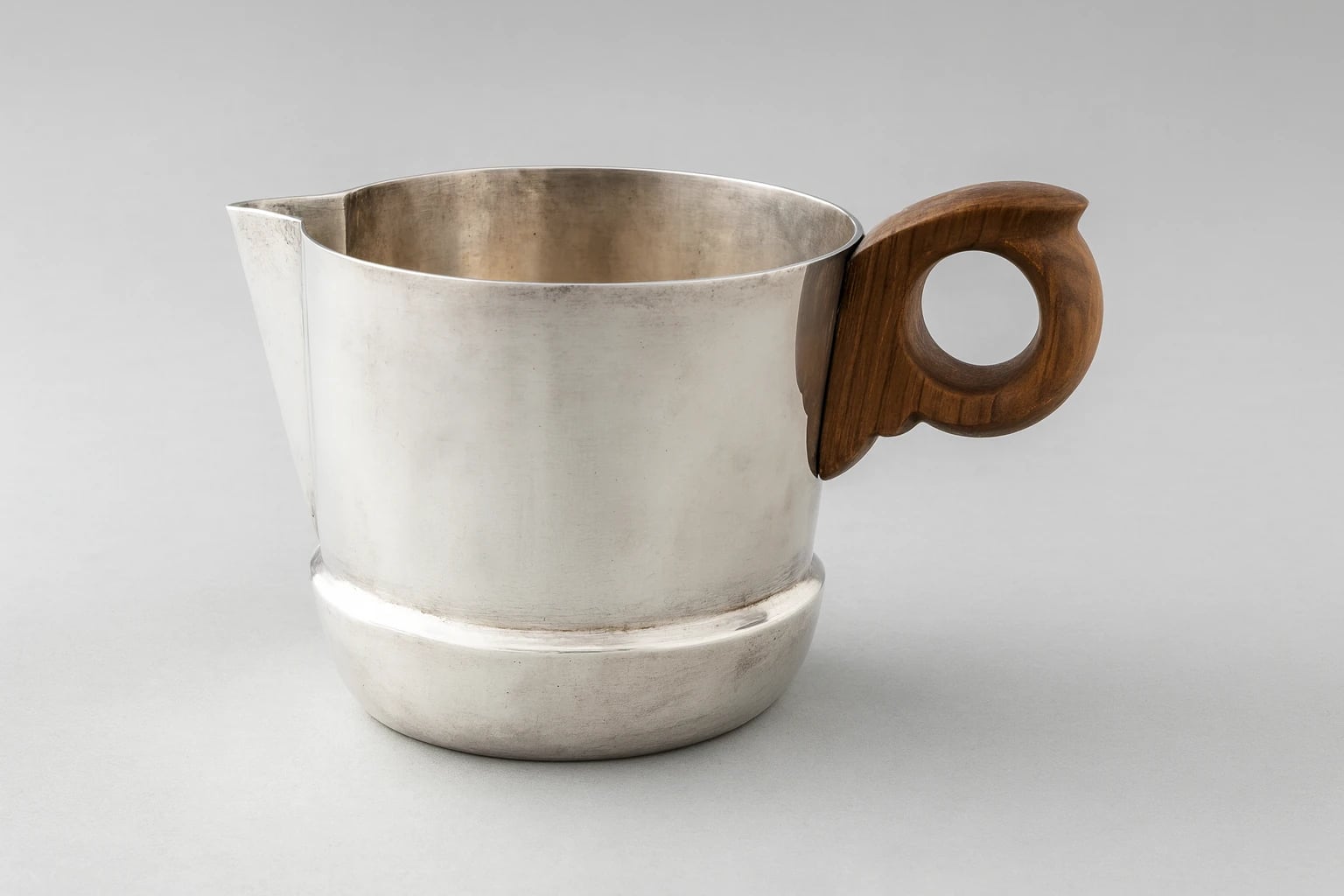 William Spratling Cream Pitcher with Round Rosewood Handles